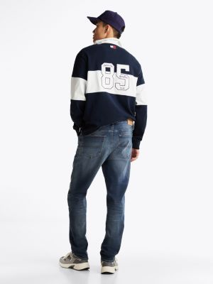 vaqueros ryan rectos de corte ajustado y efecto desteñido azul de hombres tommy jeans