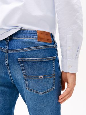 blau scanton slim jeans mit fade-effekt für herren - tommy jeans