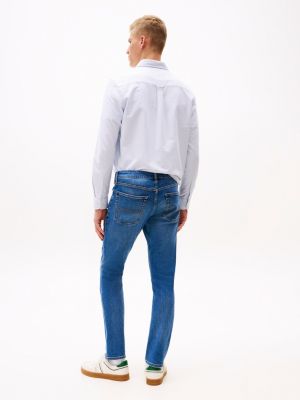 blau scanton slim jeans mit fade-effekt für herren - tommy jeans