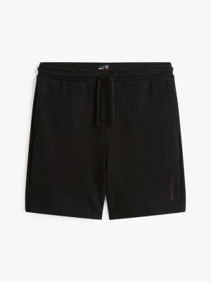 zwart relaxed sweatshort met wafelsteek voor heren - tommy jeans