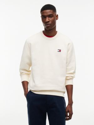 beige tommy badge crew neck sweatshirt for men tommy jeans