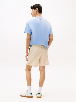 beige gestreifte loose fit seersucker-shorts für herren - tommy jeans