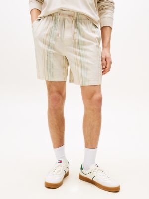 shorts larghi a righe in rilievo multicolore da uomini tommy jeans