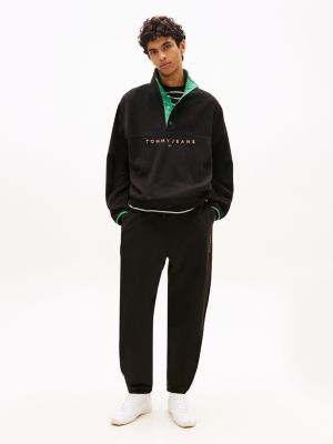 black jogginghose aus fleece mit linear-logo für herren - tommy jeans