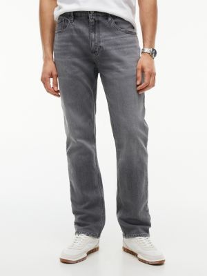 denim jeansy slim straight ryan z przetarciami dla mężczyźni - tommy jeans