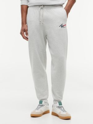 joggers con bajo elástico y logo distintivo grey de hombres tommy jeans