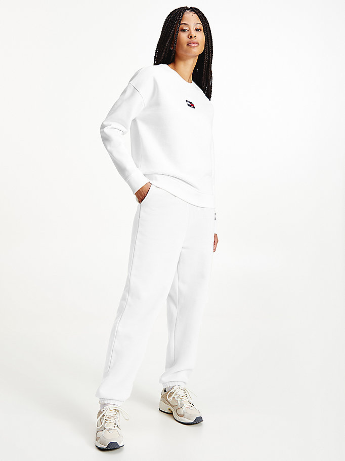 white tommy badge sweatshirt for women tommy jeans