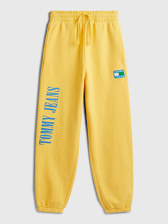 geel exclusive pop drop jogger met vlag voor dames - tommy jeans