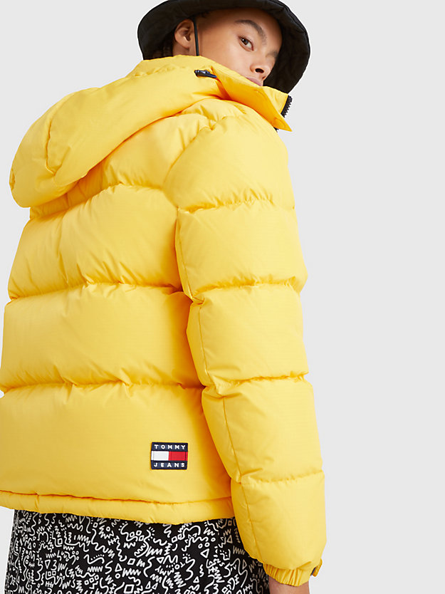WARM YELLOW Badge Hooded Alaska Puffer for women TOMMY JEANS