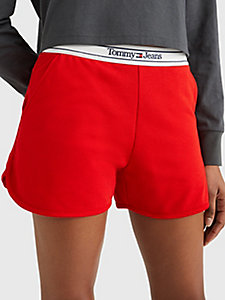 pantalón corto de chándal con cinta y logo rojo de mujer tommy jeans