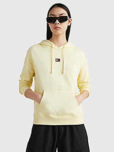 gelb boxy fit hoodie mit badge für damen - tommy jeans