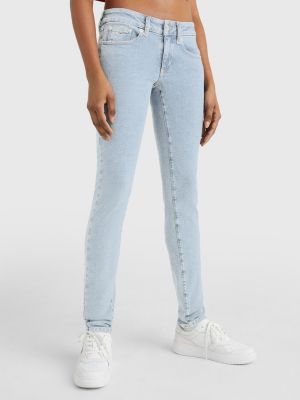 Tommy Jeans all over print monogram print skinny jeans in mid wash