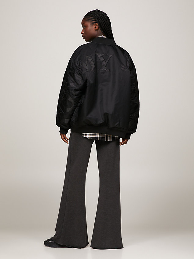 black oversized fit wattierte bomberjacke mit logo für damen - tommy jeans