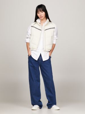 beige wattierte puffer-weste mit logo-tape für damen - tommy jeans