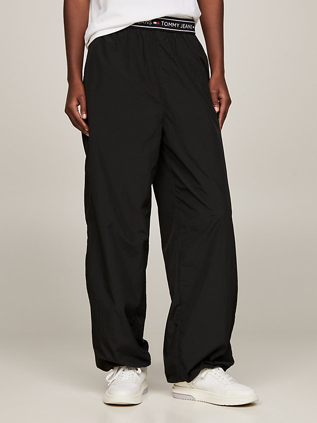 black baggy fit jogginghose mit logomuster-bund für damen - tommy jeans