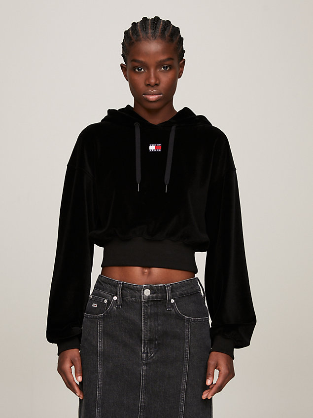 black cropped fit velours-hoodie mit logo für damen - tommy jeans