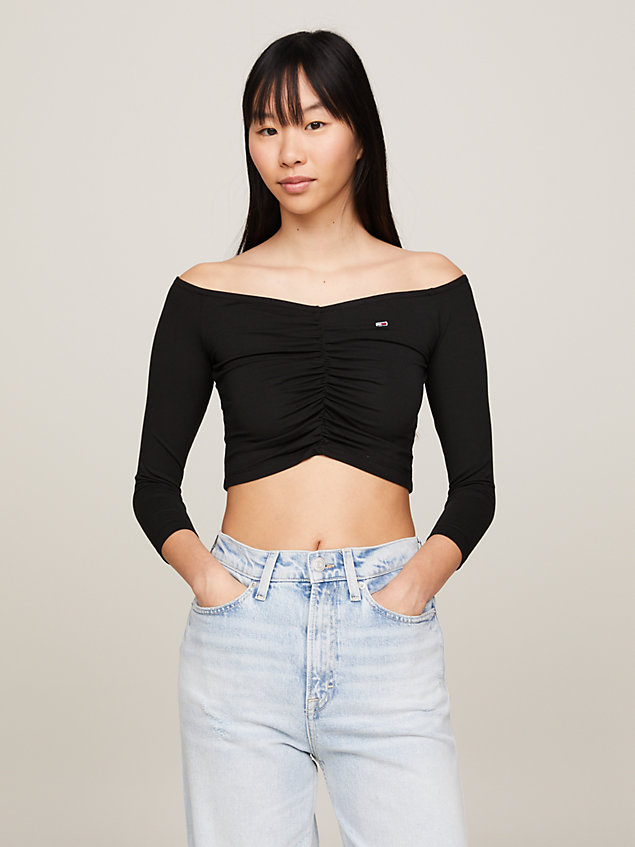 black essential slim fit off-the-shoulder crop top for women tommy jeans