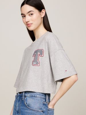 t-shirt crop con grafica stile college grigio da donne tommy jeans