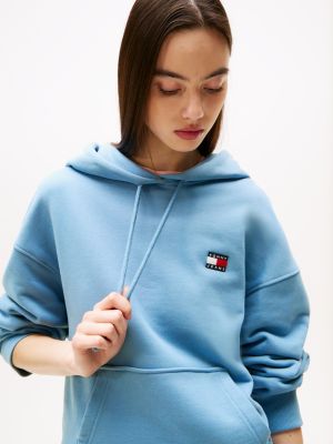 blau boxy fit hoodie mit tommy-badge für damen - tommy jeans