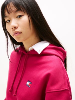 roze boxy hoodie met tommy-badge voor dames - tommy jeans