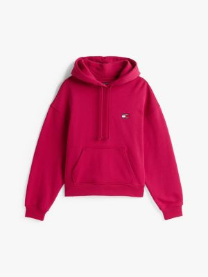 roze boxy hoodie met tommy-badge voor dames - tommy jeans