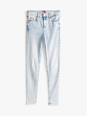 blau nora knöchellange skinny jeans mit mittelhohem bund für damen - tommy jeans