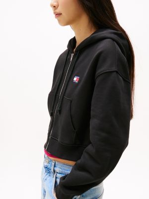 sweat à capuche boxy tommy badge zippé noir pour femmes tommy jeans