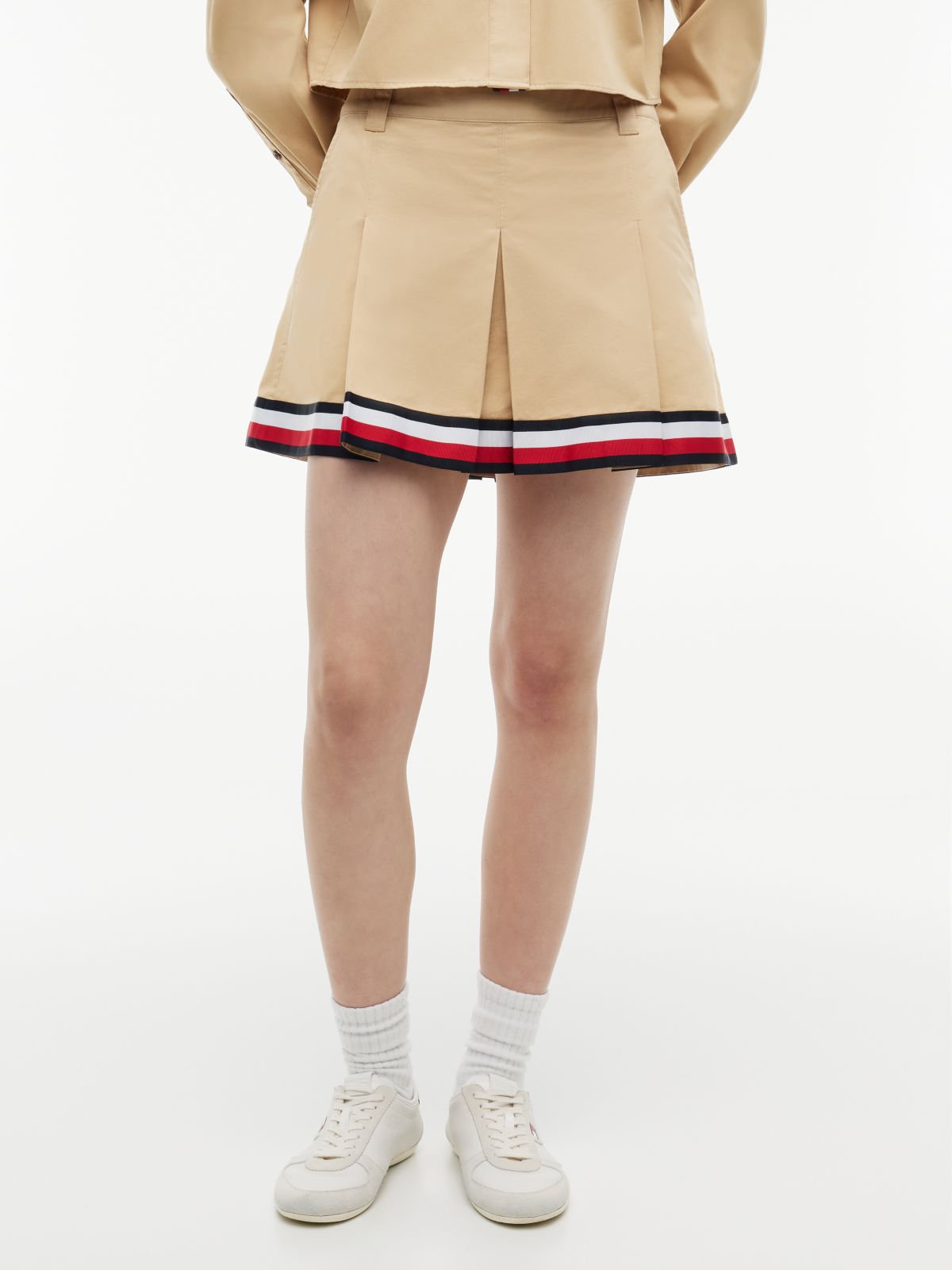 Global Stripe Tape Pleated Mini Skirt — Beige