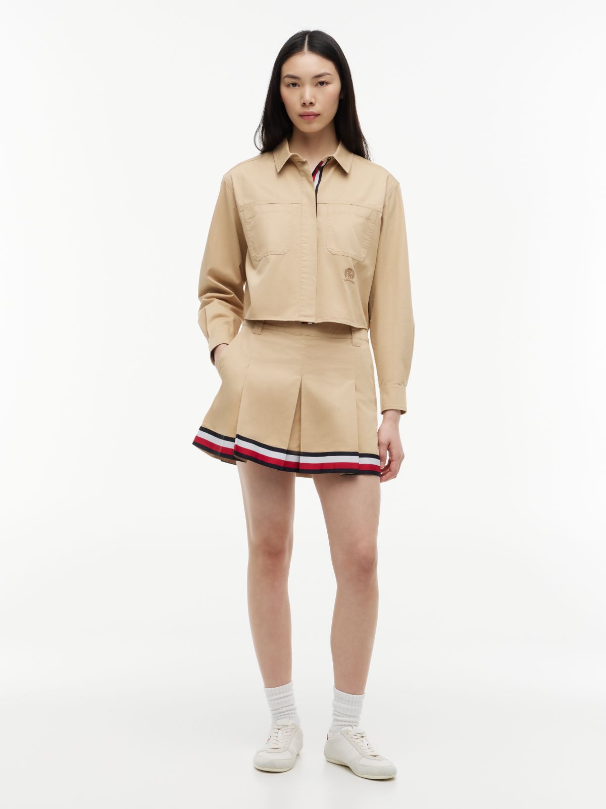 Global Stripe Tape Pleated Mini Skirt — Beige