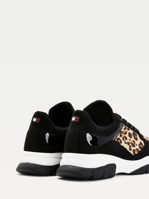 leopard print and black trainers