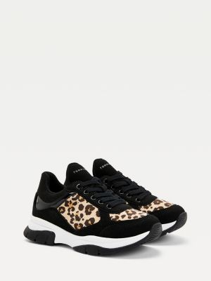 leopard and black trainers