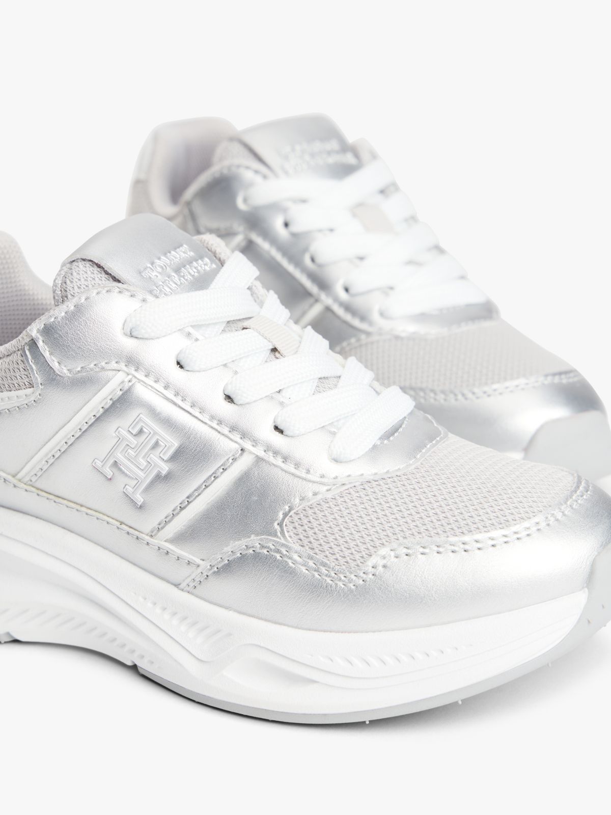 TH Monogram Metallic Chunky Trainers — Silver