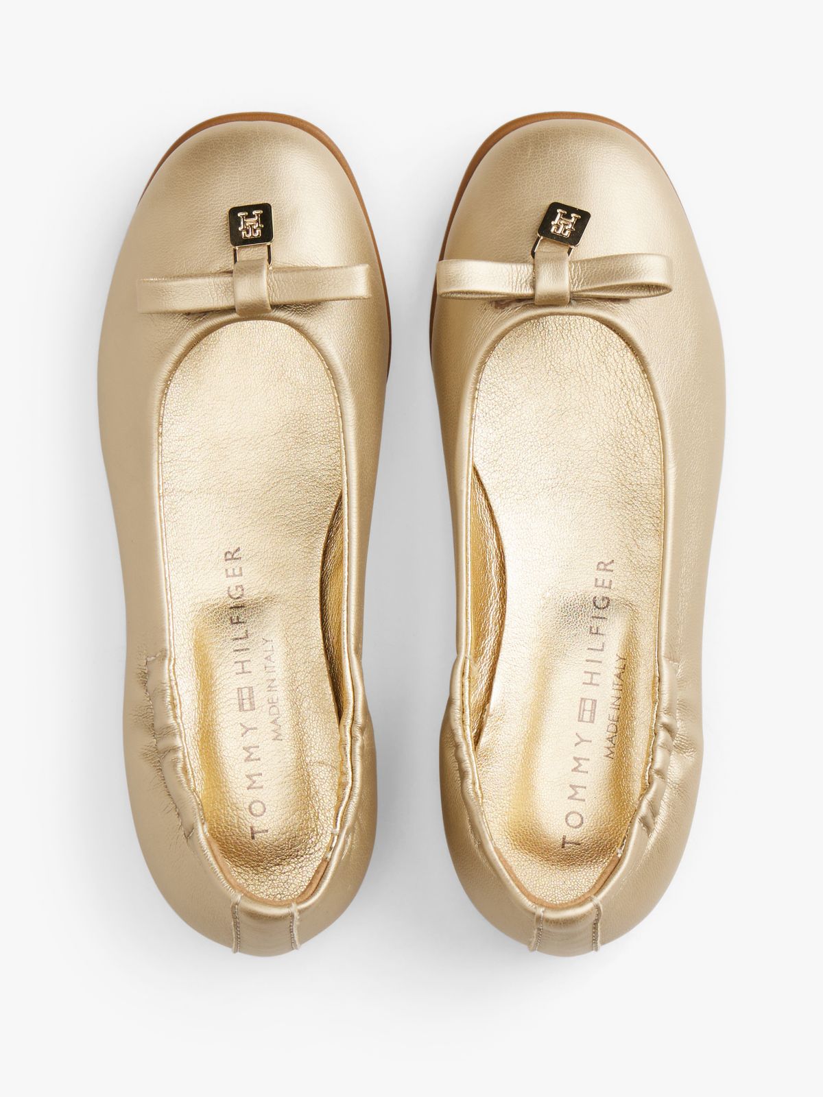 TH Monogram Bow Ballerinas — Gold