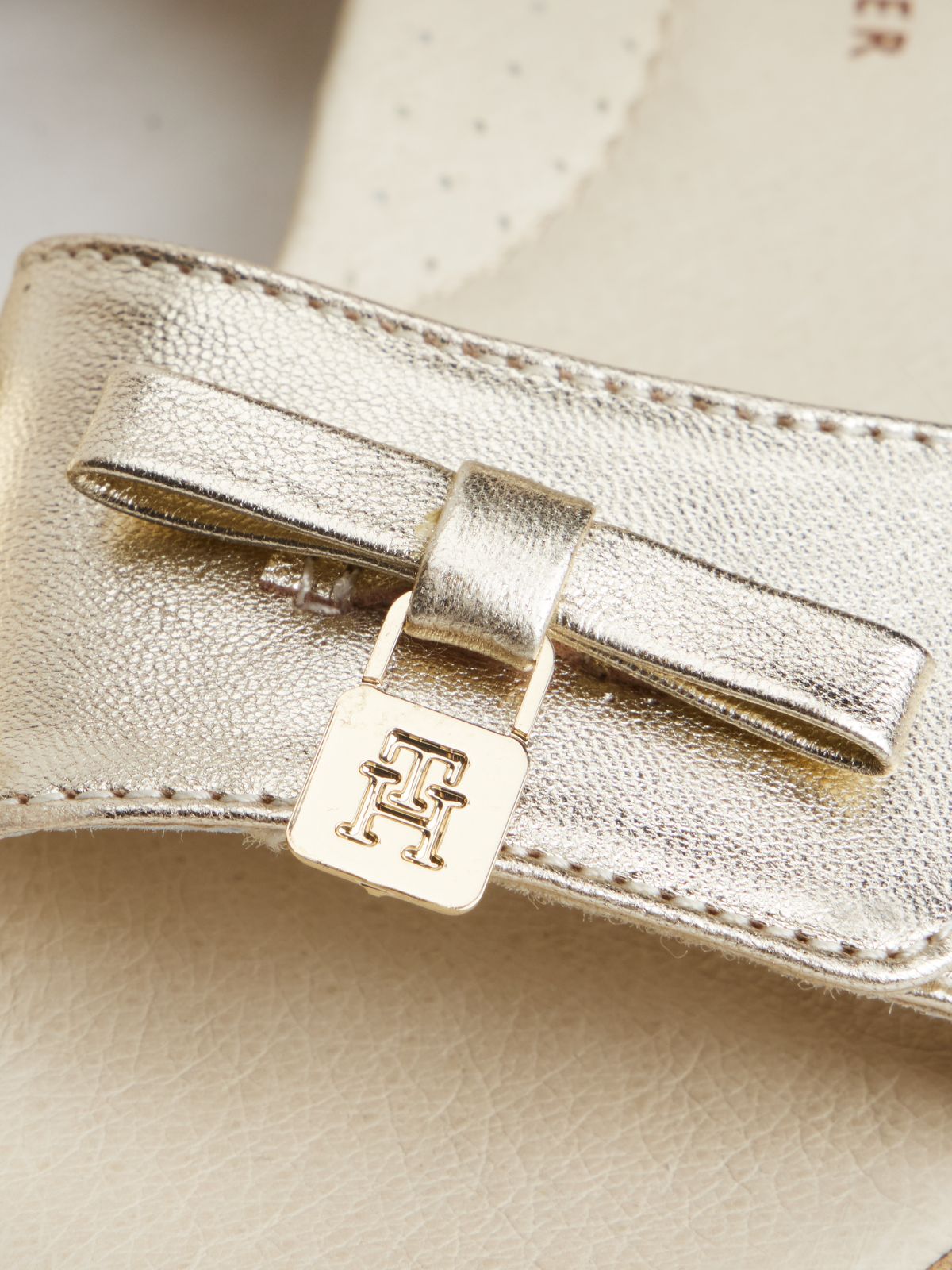 TH Monogram Metallic Leather Sandals — Gold