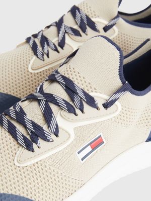 beige running trainers