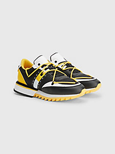 yellow cleated spliced runner trainers for men tommy jeans