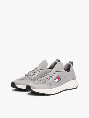 multi logo embossed knit trainers for men tommy jeans