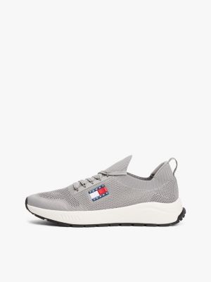 multi logo embossed knit trainers for men tommy jeans