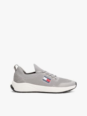 multi logo embossed knit trainers for men tommy jeans