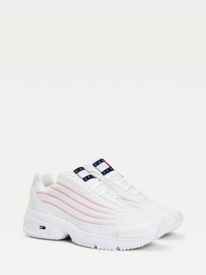 black trainers with white stripe