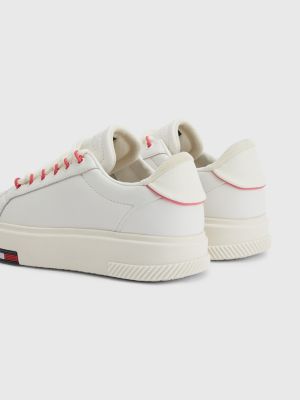 red slip on trainers womens