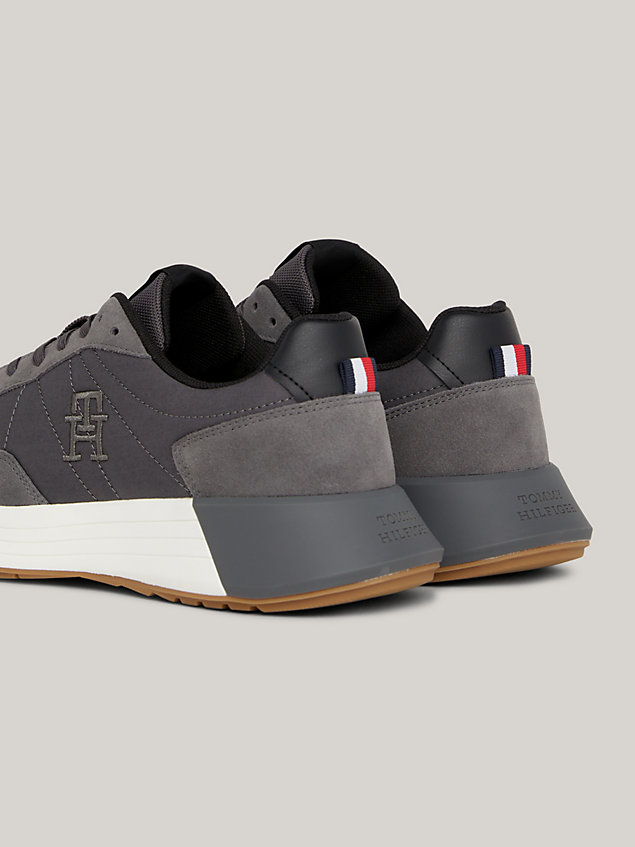 grey classics elevated th monogram runner trainers for men tommy hilfiger