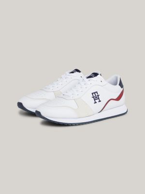 white leder-sneaker mit monogramm und haifischsohle für herren - tommy hilfiger