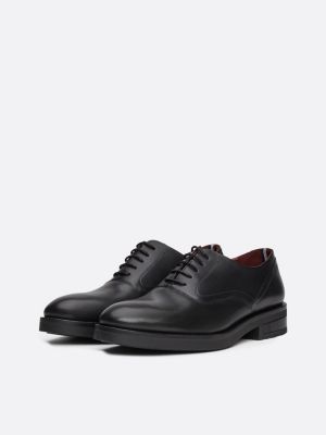 scarpe derby in pelle con monogramma th nero da uomini tommy hilfiger