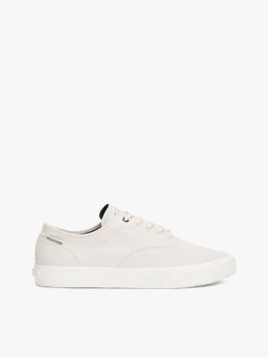 beige canvas embossed logo trainers for men tommy hilfiger