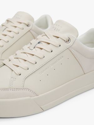 beige debossed logo court trainers for men tommy hilfiger