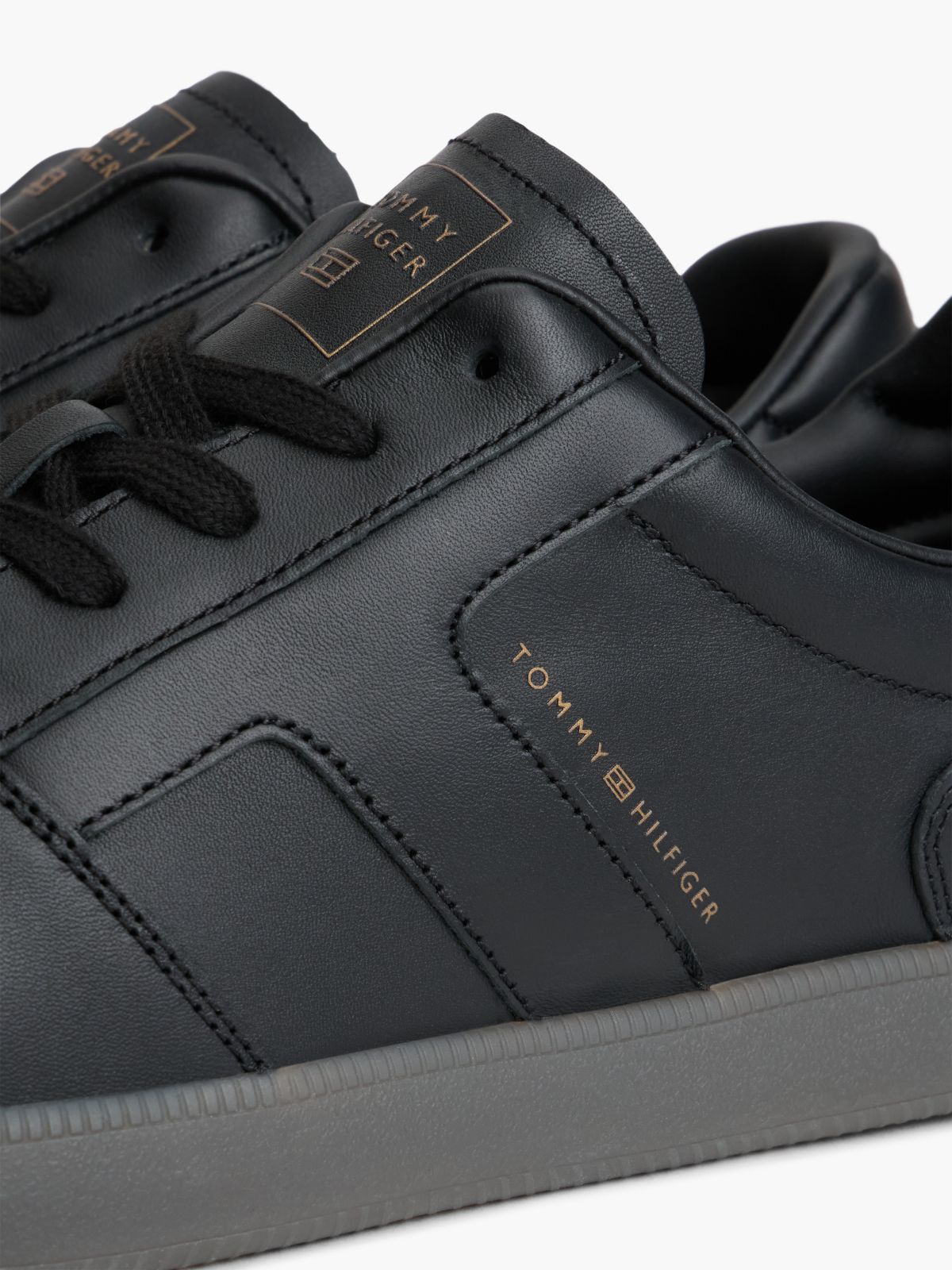 Leather Metallic Logo Trainers — Black