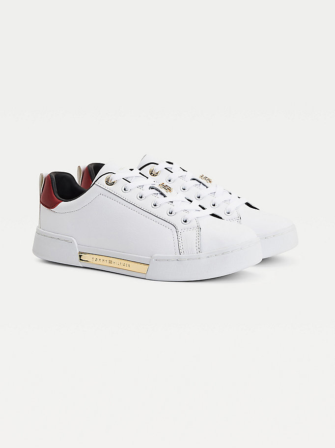 white elevated monogram cupsole trainers for women tommy hilfiger