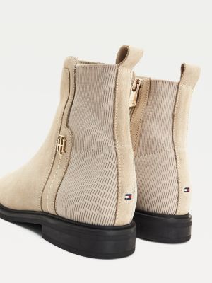 monogram plaque long leather boots