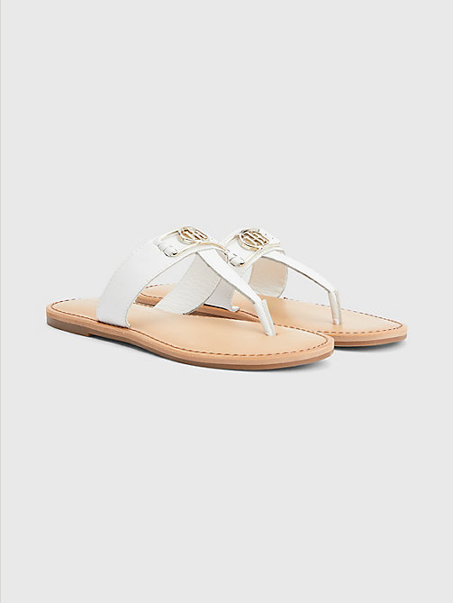 white th interlock plaque flat leather sandals for women tommy hilfiger